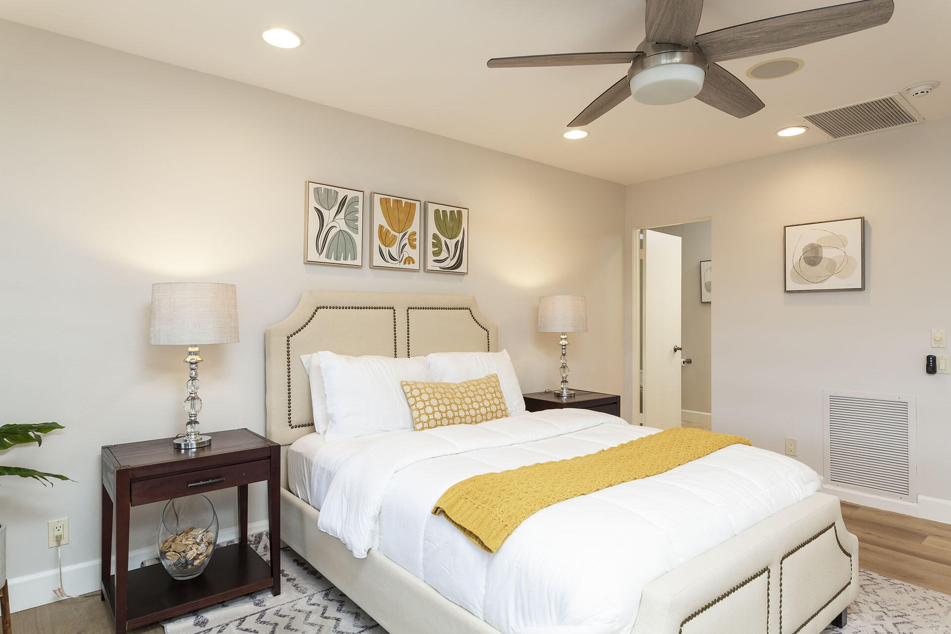 32 Colgate Drive Rancho Mirage, CA 92270 - Photo 37 of 51 a bedroom with a bed and a night stand