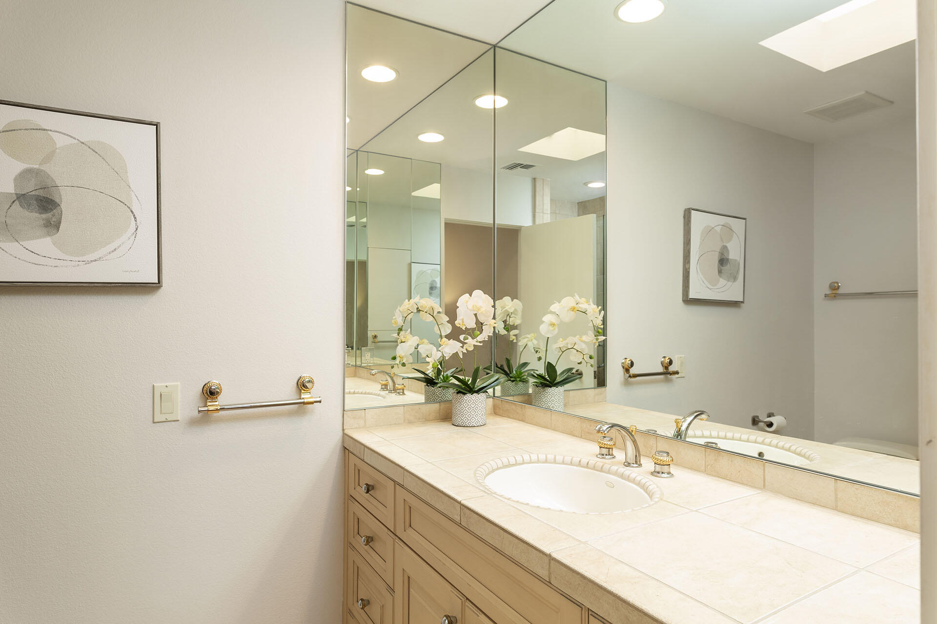 32 Colgate Drive Rancho Mirage, CA 92270 - Photo 38 of 51 a bathroom with a sink and a mirror