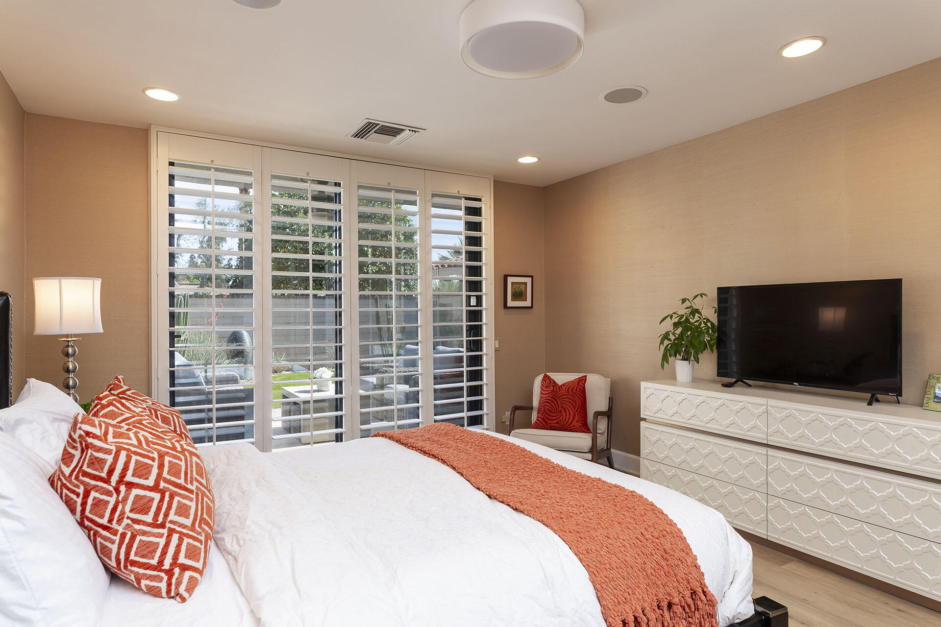 32 Colgate Drive Rancho Mirage, CA 92270 - Photo 40 of 51 a bedroom with a large bed and a flat screen tv