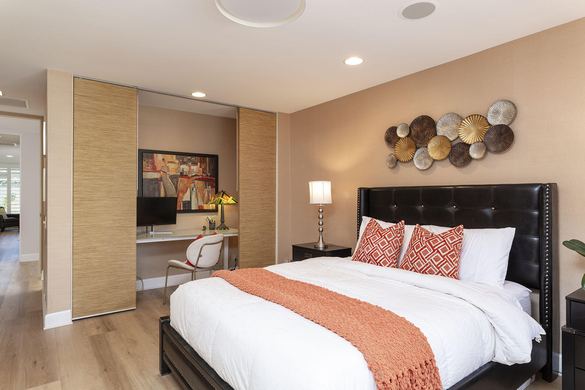 32 Colgate Drive Rancho Mirage, CA 92270 - Photo 41 of 51 a bedroom with a large bed and a wooden floor