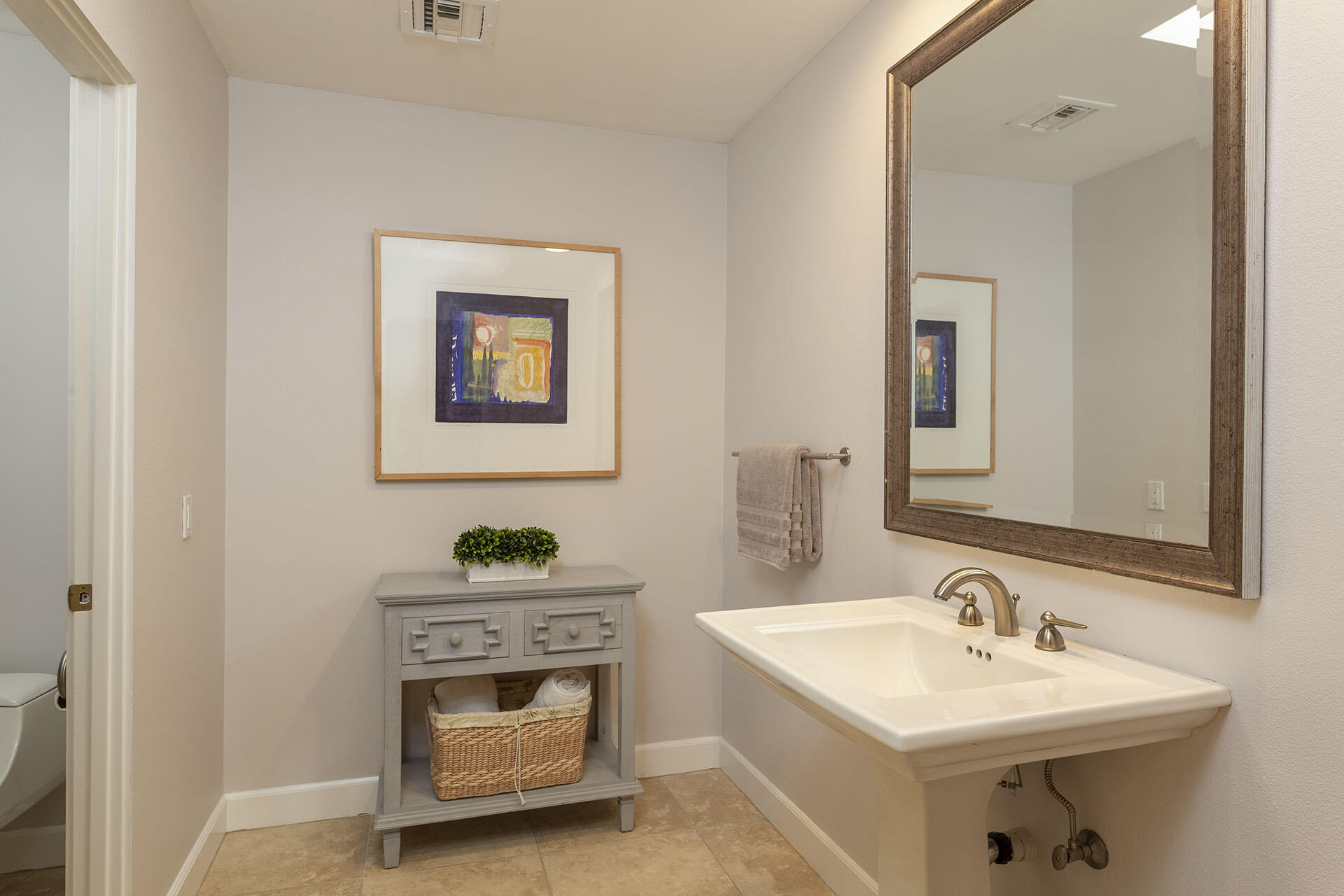 32 Colgate Drive Rancho Mirage, CA 92270 - Photo 42 of 51 a bathroom with a sink and a mirror