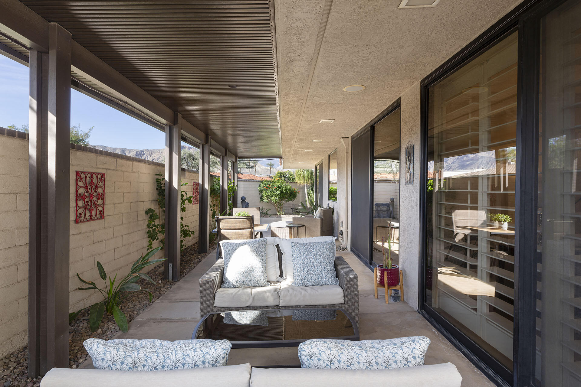 32 Colgate Drive Rancho Mirage, CA 92270 - Photo 44 of 51 a living room with furniture and a large window