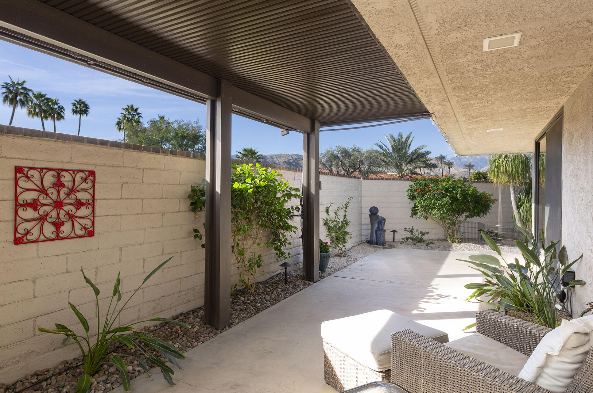 32 Colgate Drive Rancho Mirage, CA 92270 - Photo 46 of 51 a balcony with table and chairs
