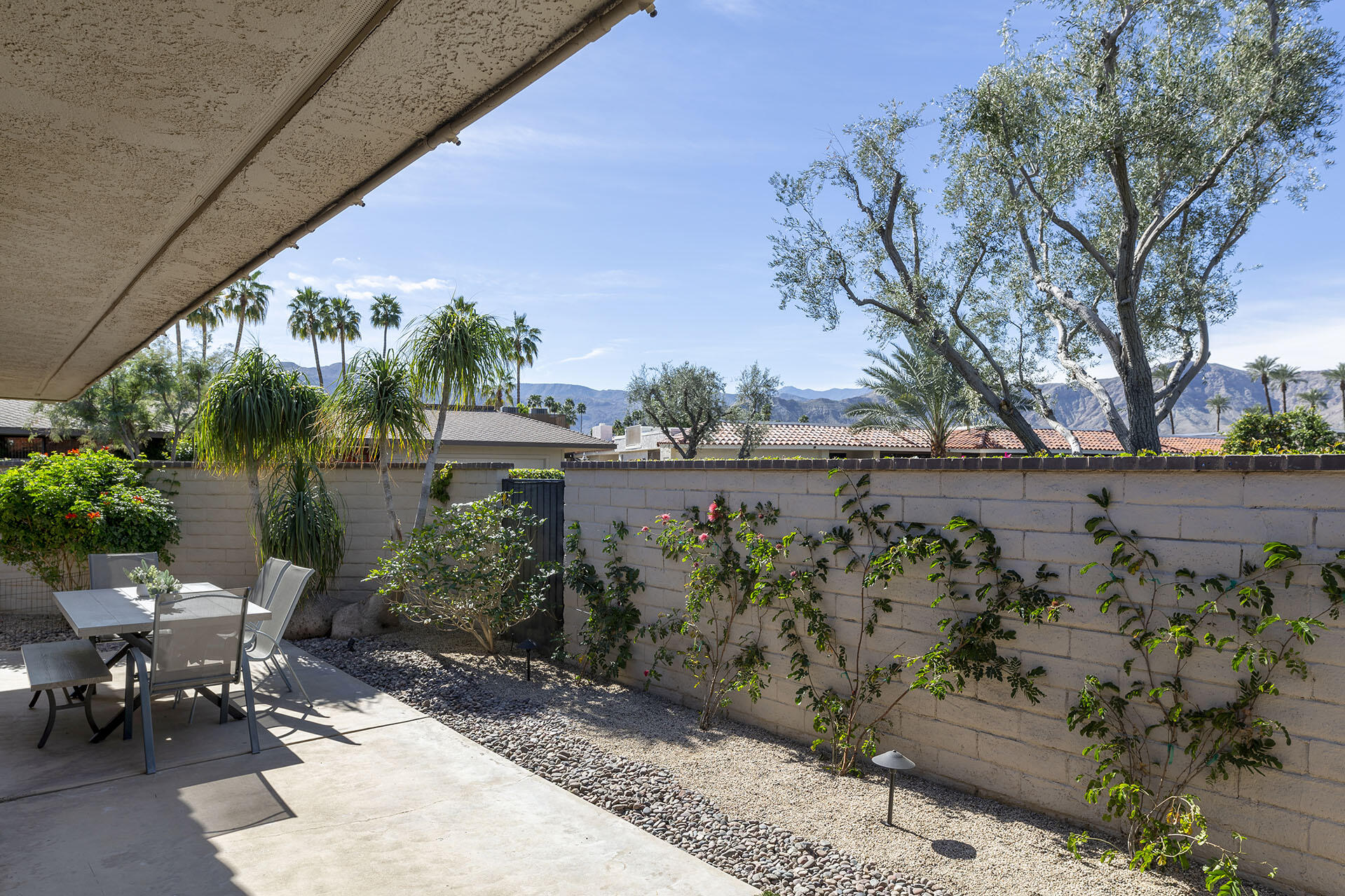 32 Colgate Drive Rancho Mirage, CA 92270 - Photo 48 of 51 a garden view with a seating space