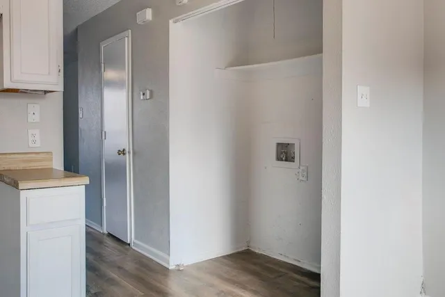 a view of a kitchen with a sink