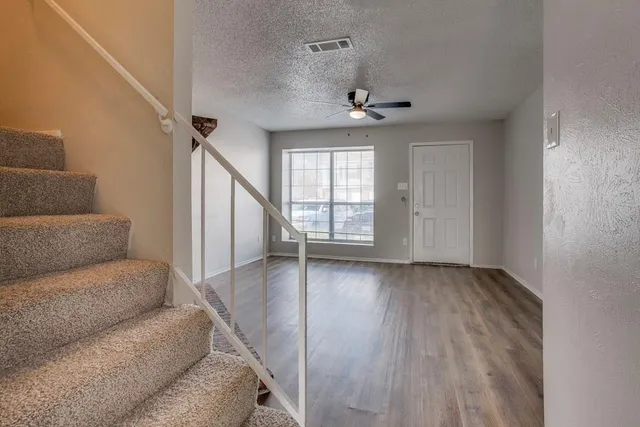 a view of livingroom with furniture and windows