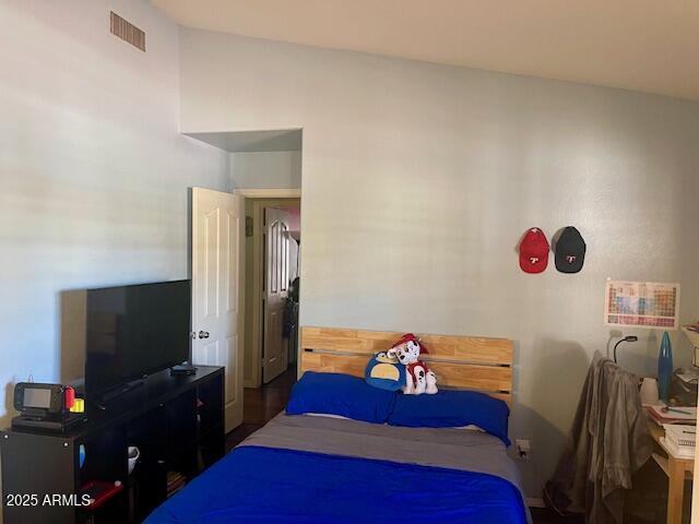 7239 West Morrow Drive Glendale, AZ 85308 - Photo 9 of 19 a bedroom with a bed and a flat screen tv