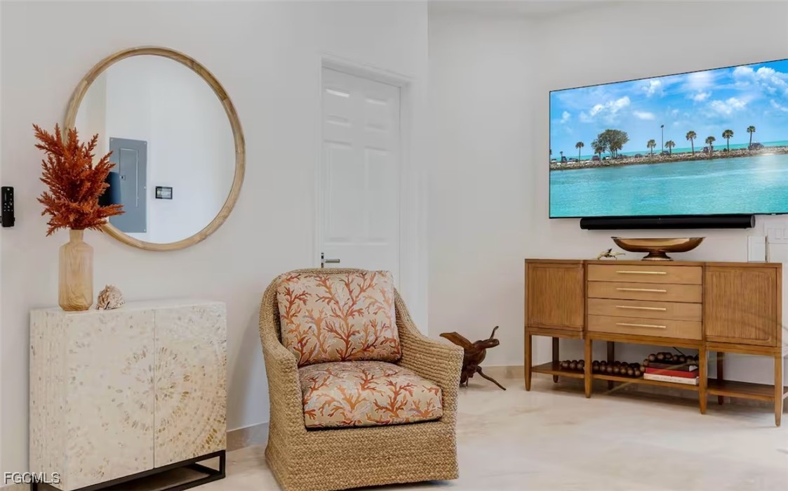 2740 North Beach Road, Unit A & B Englewood, FL 34223 - Photo 32 of 43 a living room with furniture and a mirror