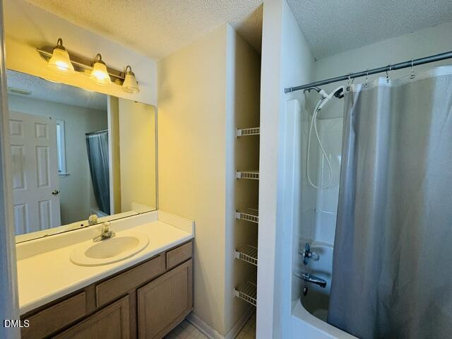 2027 Turtle Point Drive Raleigh, NC 27604 - Photo 14 of 18 a bathroom with a double vanity sink and mirror
