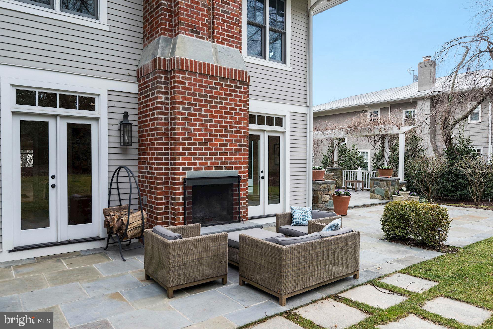 6816 Delaware Street Chevy Chase, MD 20815 - Photo 27 of 30 Rear Patio with Fireplace