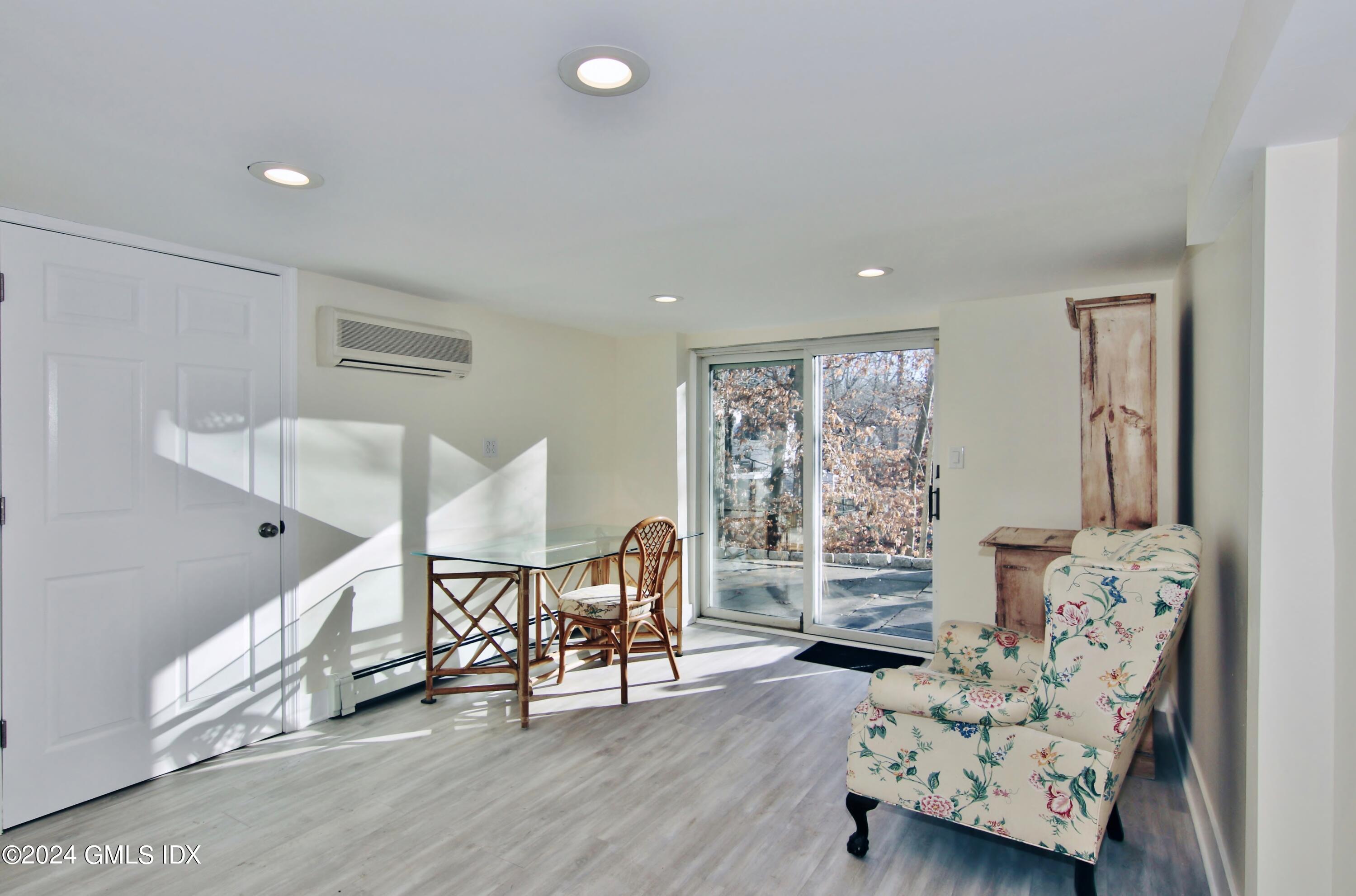 191 Sawmill Road Stamford, CT 06903 - Photo 29 of 40 a view of a livingroom with furniture and windows