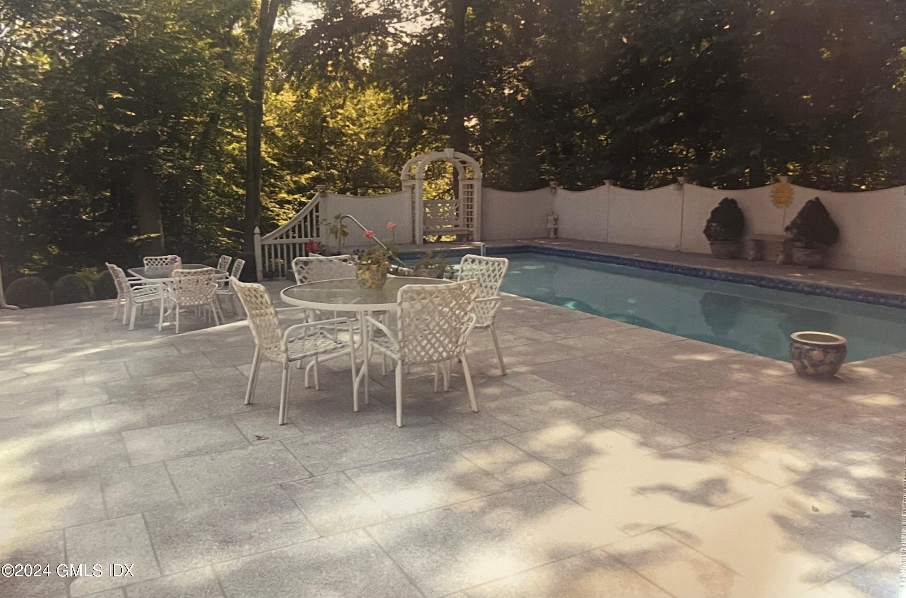 191 Sawmill Road Stamford, CT 06903 - Photo 40 of 40 a view of a backyard with sitting area