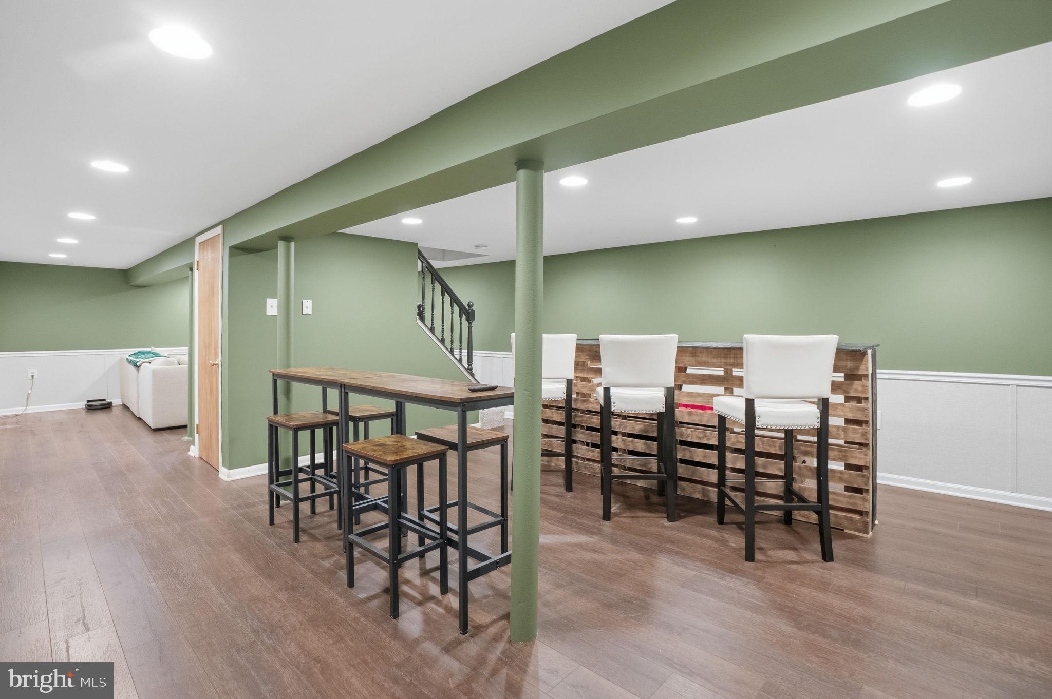 303 Radcliffe Road Glenside, PA 19038 - Photo 23 of 36 a view of a dining room with furniture and wooden floor