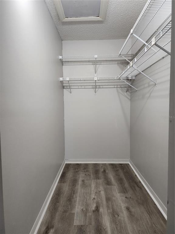 1102 Halton Court, Unit 1102 Sun City Center, FL 33573 - Photo 15 of 58 a view of a room with racks on the wall