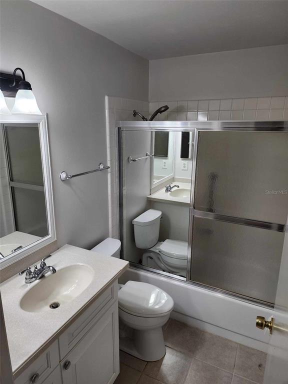 1102 Halton Court, Unit 1102 Sun City Center, FL 33573 - Photo 21 of 58 a bathroom with a sink toilet and shower