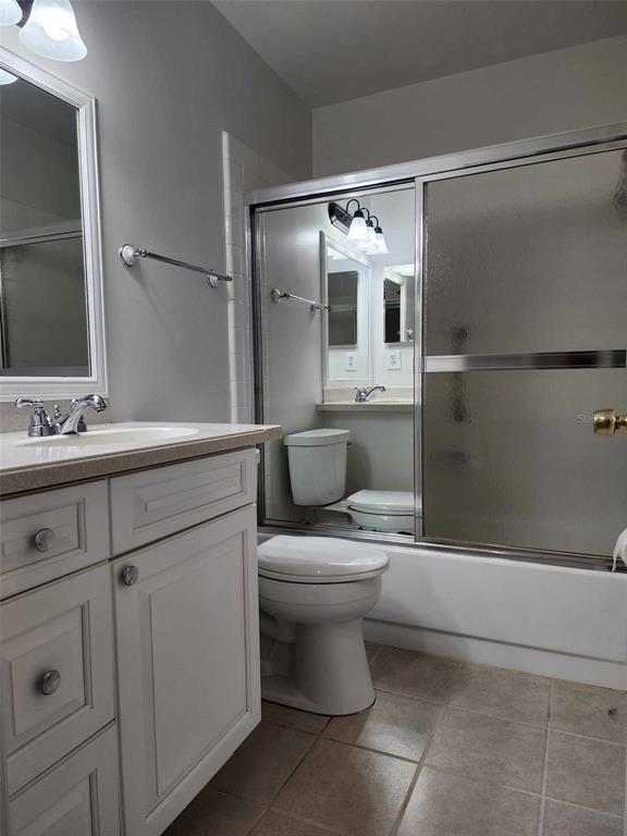 1102 Halton Court, Unit 1102 Sun City Center, FL 33573 - Photo 22 of 58 a bathroom with a sink a toilet and shower
