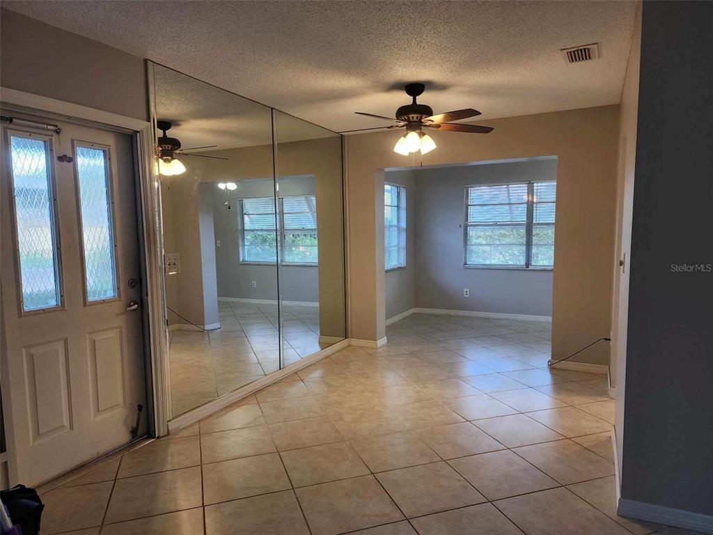 1102 Halton Court, Unit 1102 Sun City Center, FL 33573 - Photo 24 of 58 a view of an empty room with a window