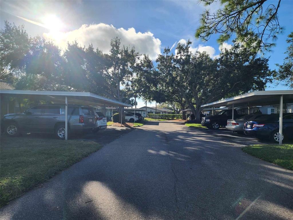 1102 Halton Court, Unit 1102 Sun City Center, FL 33573 - Photo 38 of 58 a view of street with parked cars