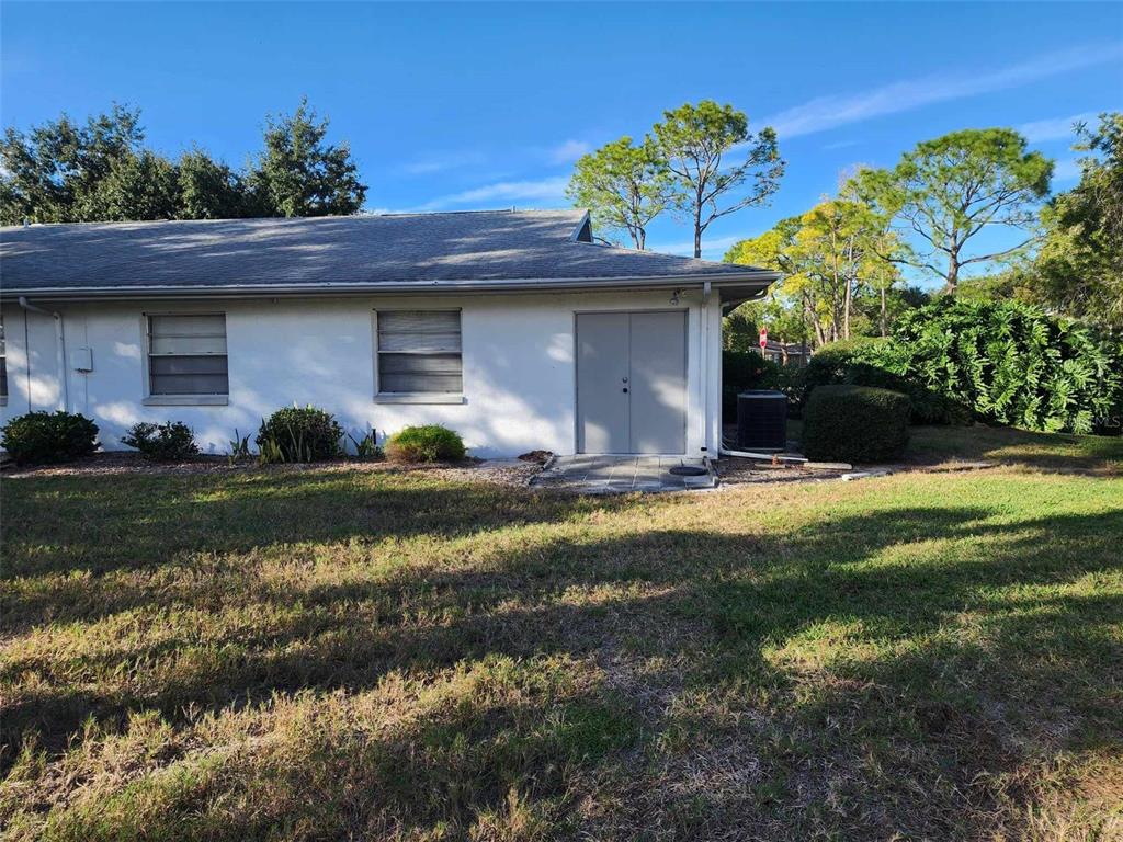 1102 Halton Court, Unit 1102 Sun City Center, FL 33573 - Photo 41 of 58 a view of a house with a yard