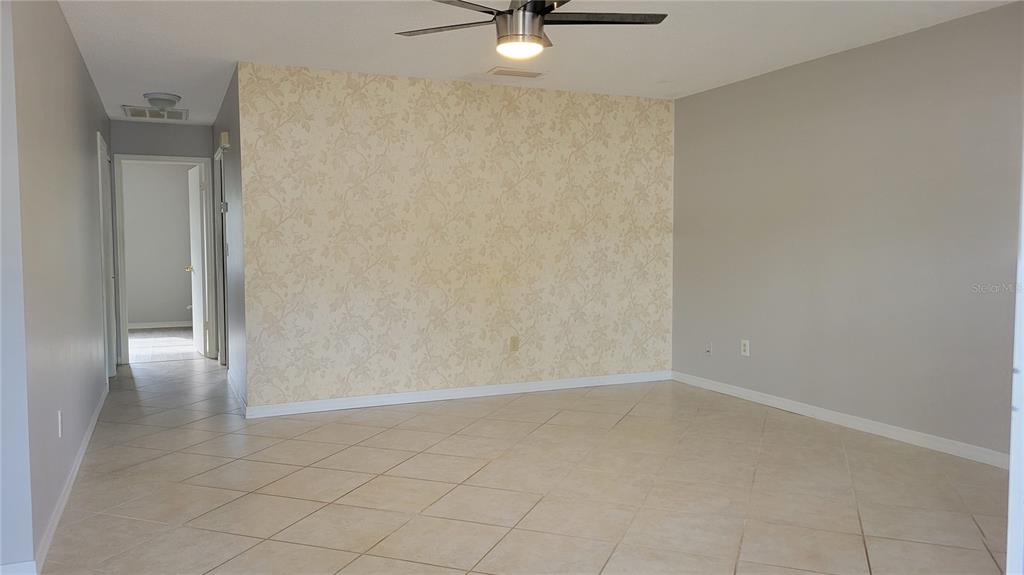 1102 Halton Court, Unit 1102 Sun City Center, FL 33573 - Photo 5 of 58 a view of an empty room