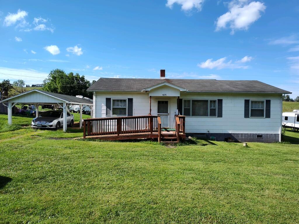 483 Laurel Branch Road Northwest Floyd, VA 24091 - Photo 1 of 19 a front view of a house with garden and trees