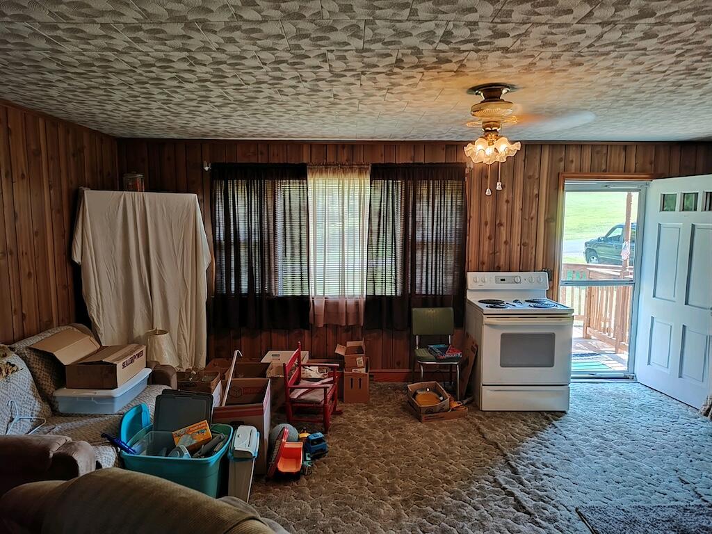 483 Laurel Branch Road Northwest Floyd, VA 24091 - Photo 11 of 19 a living room with furniture and a fireplace