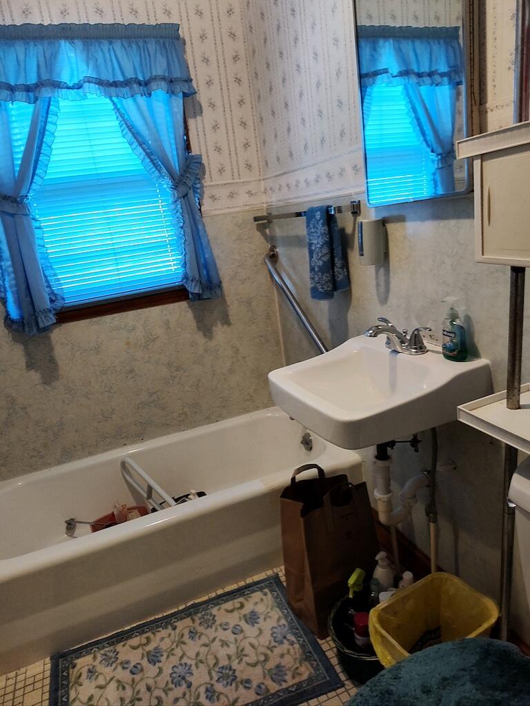 483 Laurel Branch Road Northwest Floyd, VA 24091 - Photo 13 of 19 a bathroom with a sink and a mirror