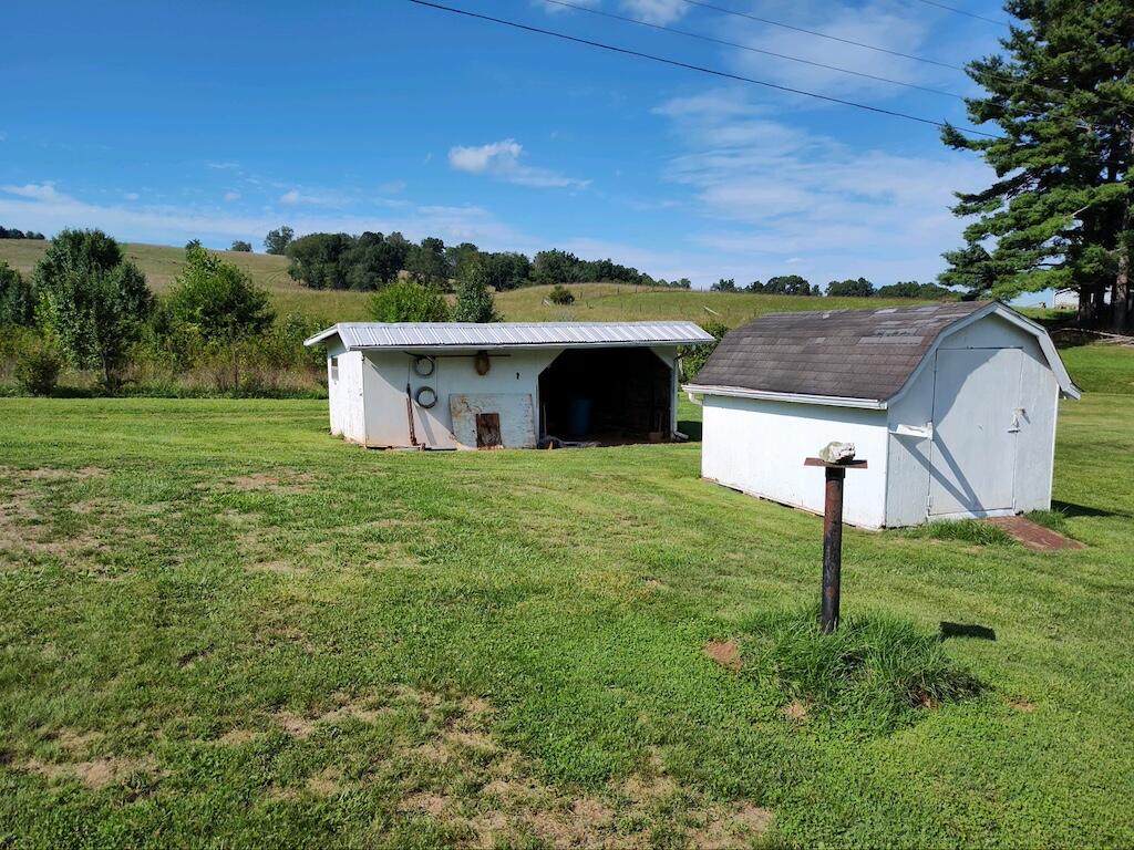 483 Laurel Branch Road Northwest Floyd, VA 24091 - Photo 17 of 19 a house view with a garden space