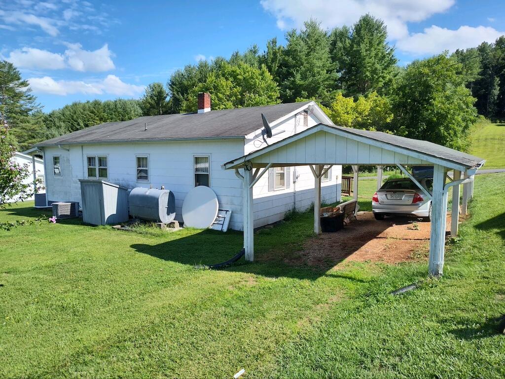 483 Laurel Branch Road Northwest Floyd, VA 24091 - Photo 19 of 19 a view of a house with backyard and sitting area