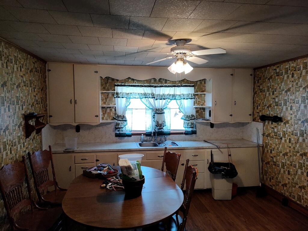 483 Laurel Branch Road Northwest Floyd, VA 24091 - Photo 7 of 19 a kitchen with stainless steel appliances granite countertop a sink window and cabinets