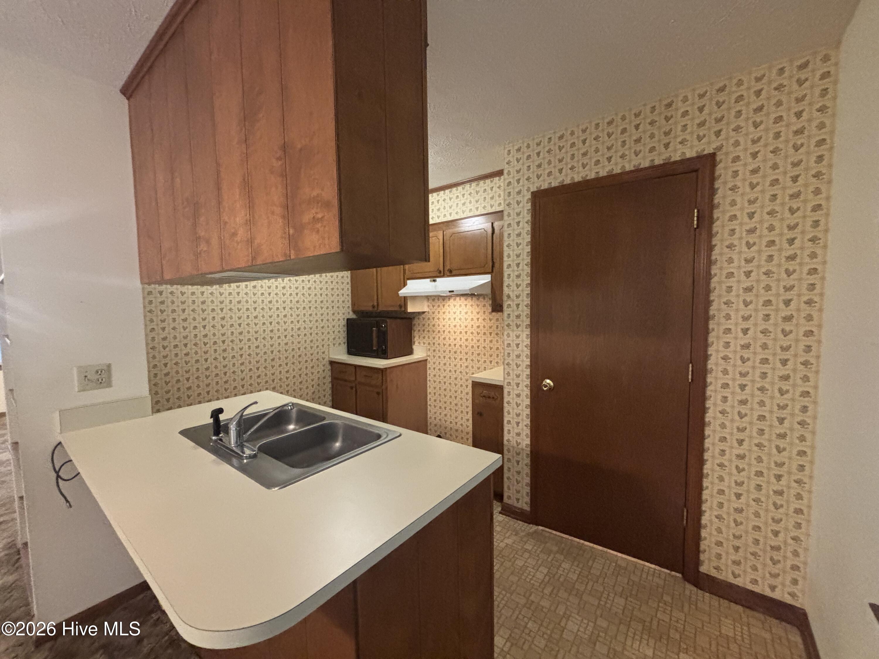 120 Kings Road Whiteville, NC 28472 - Photo 15 of 25 Laundry Room is off of kitchen.