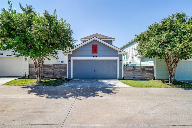 a house with trees in front of it
