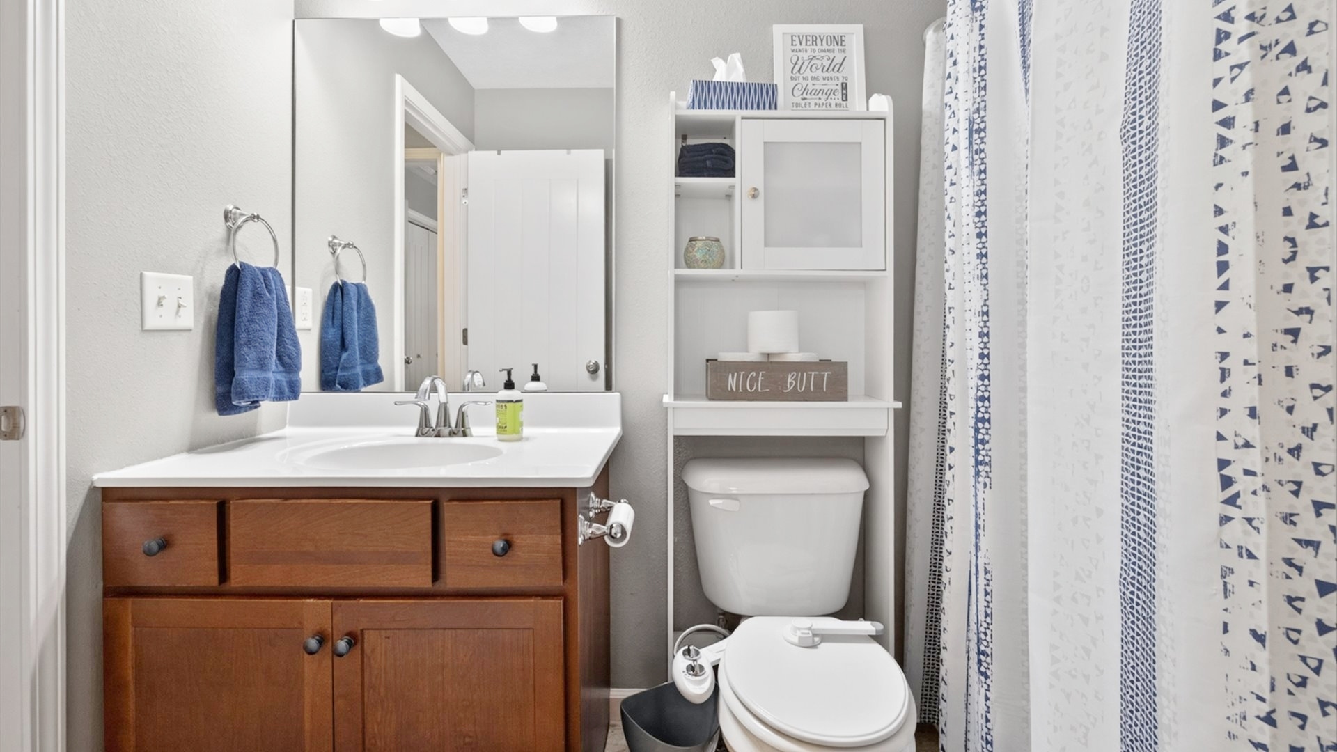 308 East Locust Street Normal, IL 61761 - Photo 16 of 40 a bathroom with a toilet sink and mirror