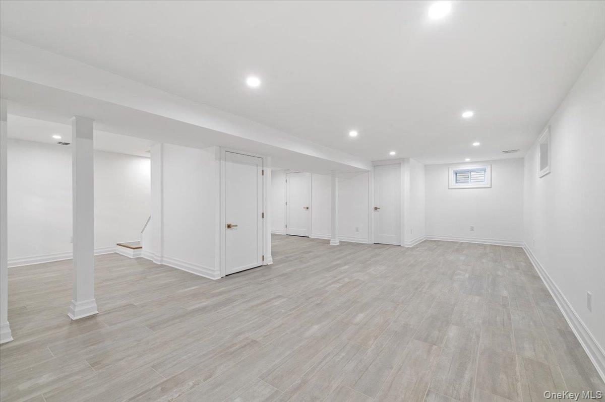 168 Martens Avenue Valley Stream, NY 11580 - Photo 20 of 26 Basement featuring recessed lighting and light wood-style flooring