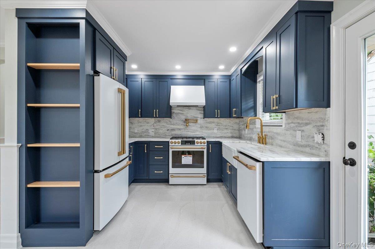 168 Martens Avenue Valley Stream, NY 11580 - Photo 6 of 26 Kitchen featuring open shelves, light stone counters, white appliances, and recessed lighting