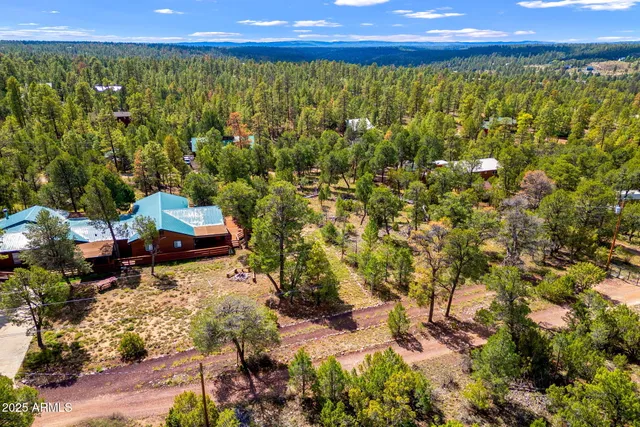a view of a yard with an outdoor seating