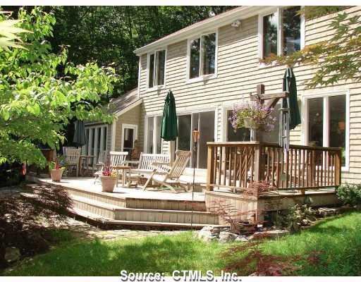 53 Cooney Road Pomfret, CT 06259 - Photo 1 of 1 a view of a house with backyard and sitting area