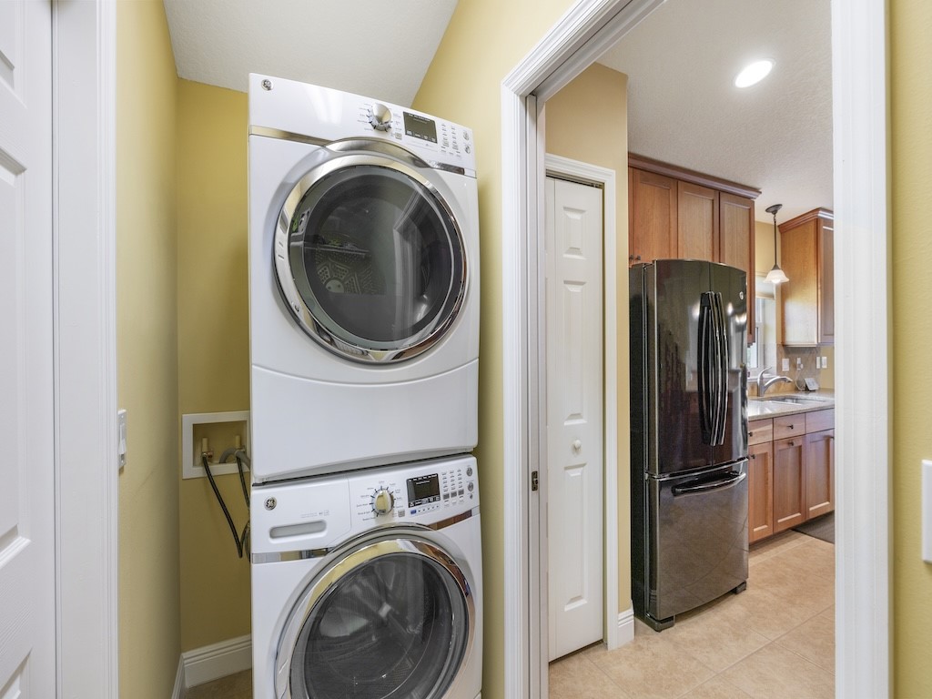 605 Monarch Way Sebastian, FL 32958 - Photo 13 of 36 a view of a kitchen with washer and dryer