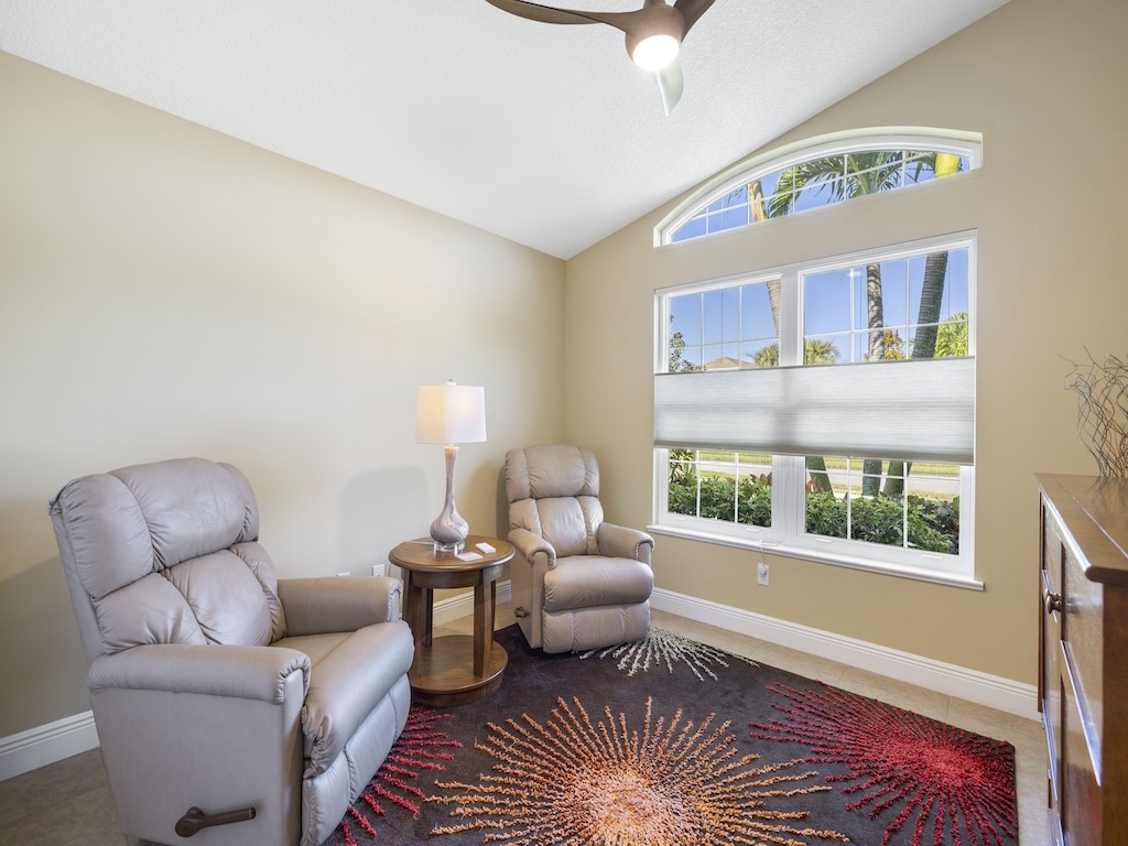 605 Monarch Way Sebastian, FL 32958 - Photo 15 of 36 a living room with furniture and a window