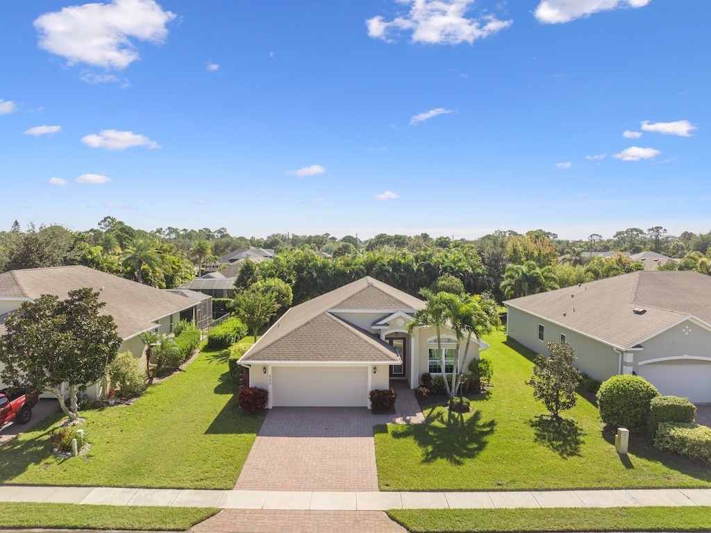 605 Monarch Way Sebastian, FL 32958 - Photo 25 of 36 an aerial view of a house with a yard