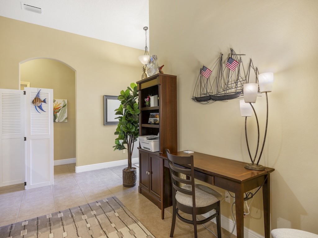 605 Monarch Way Sebastian, FL 32958 - Photo 4 of 36 a view of a livingroom with furniture and a potted plant