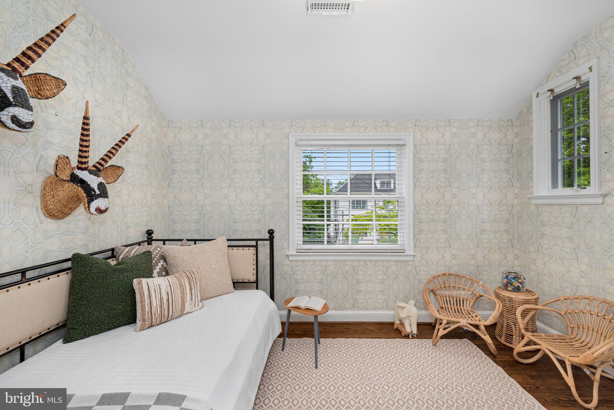 4822 Upton Street Northwest Washington, DC 20016 - Photo 25 of 48 a bedroom with furniture and a window