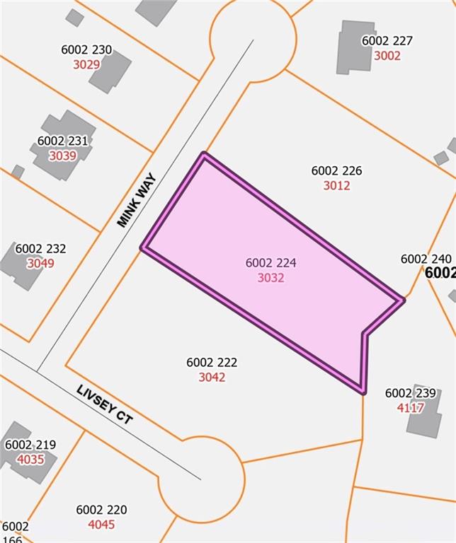 3032 Mink Way Snellville, GA 30039 - Photo 2 of 3 a close up of a street sign