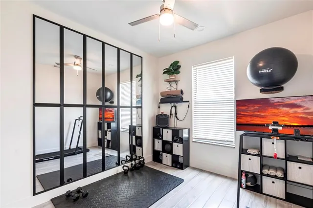 a view of a livingroom with furniture and staircase