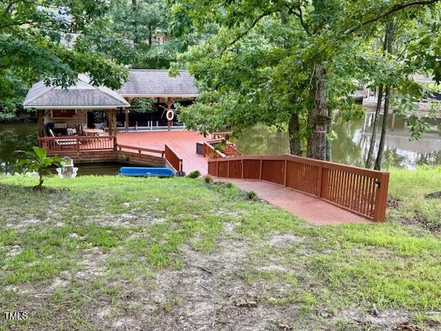 Lot D Swallowtail Drive Semora, NC 27343 - Photo 14 of 16 a view of a garden with wooden fence