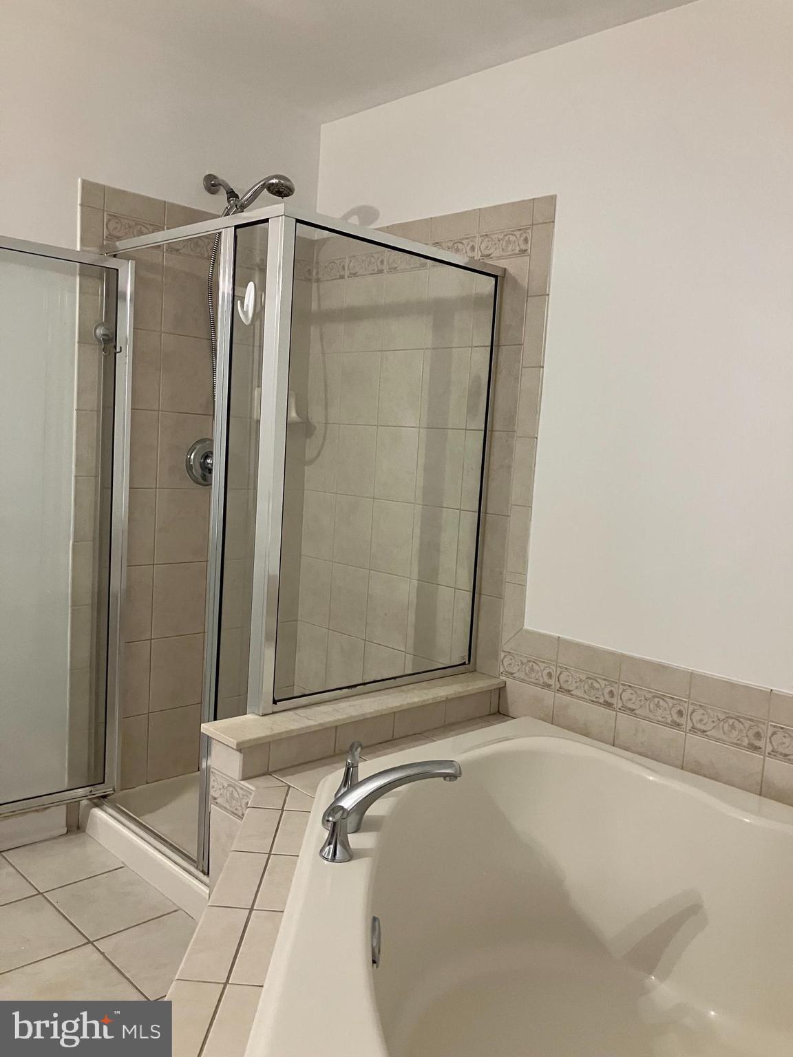 129 Sequoia Drive Berlin, NJ 08009 - Photo 11 of 17 a bathroom with a shower and a bath tub