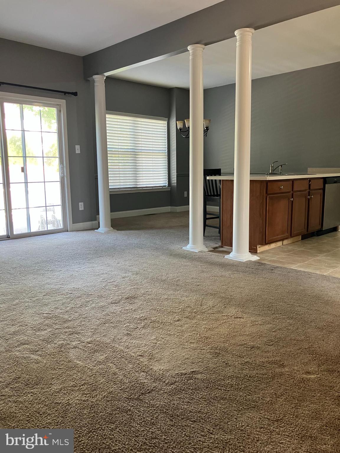 129 Sequoia Drive Berlin, NJ 08009 - Photo 2 of 17 an empty room with windows
