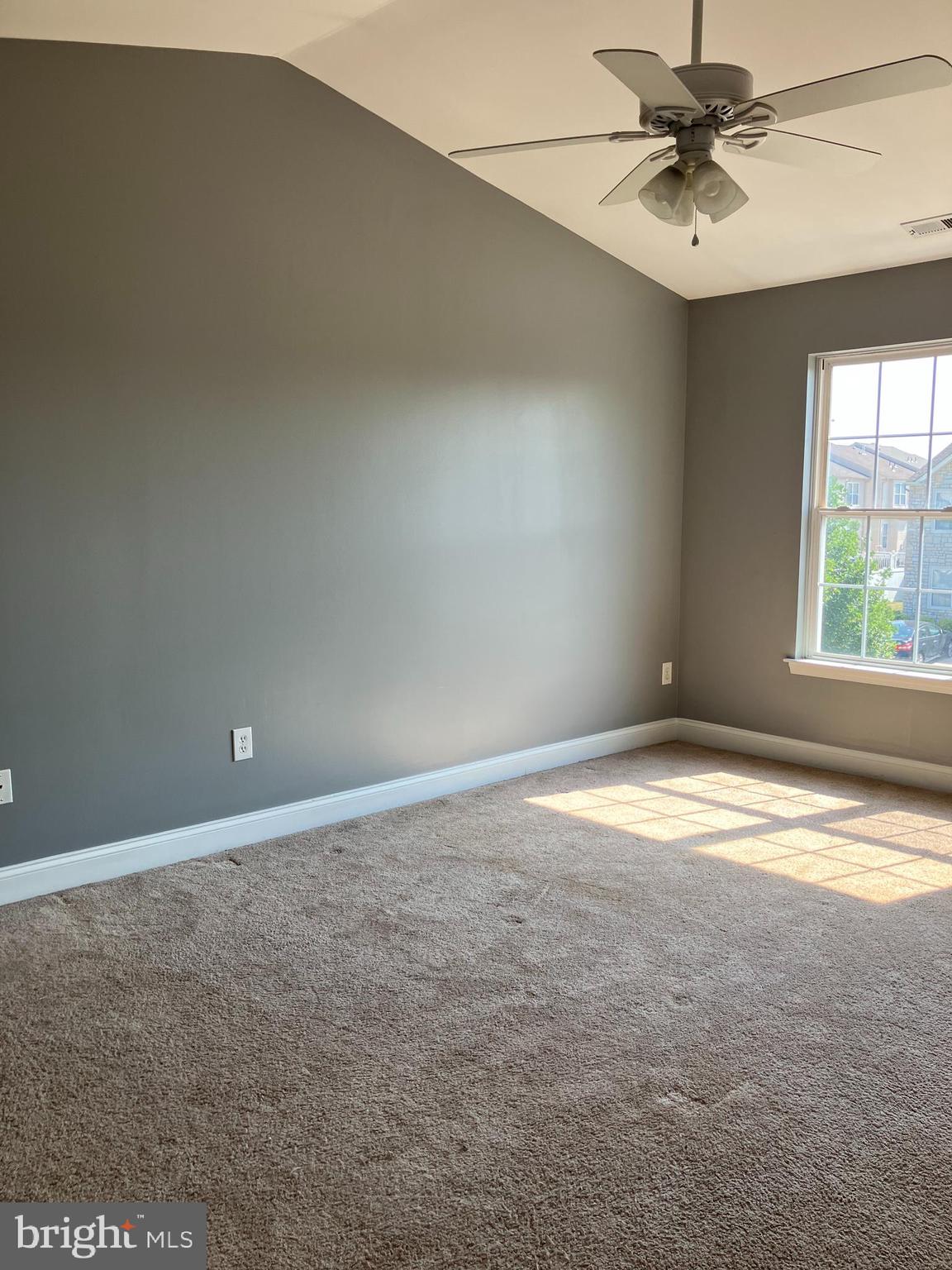 129 Sequoia Drive Berlin, NJ 08009 - Photo 9 of 17 an empty room with a window and a fan