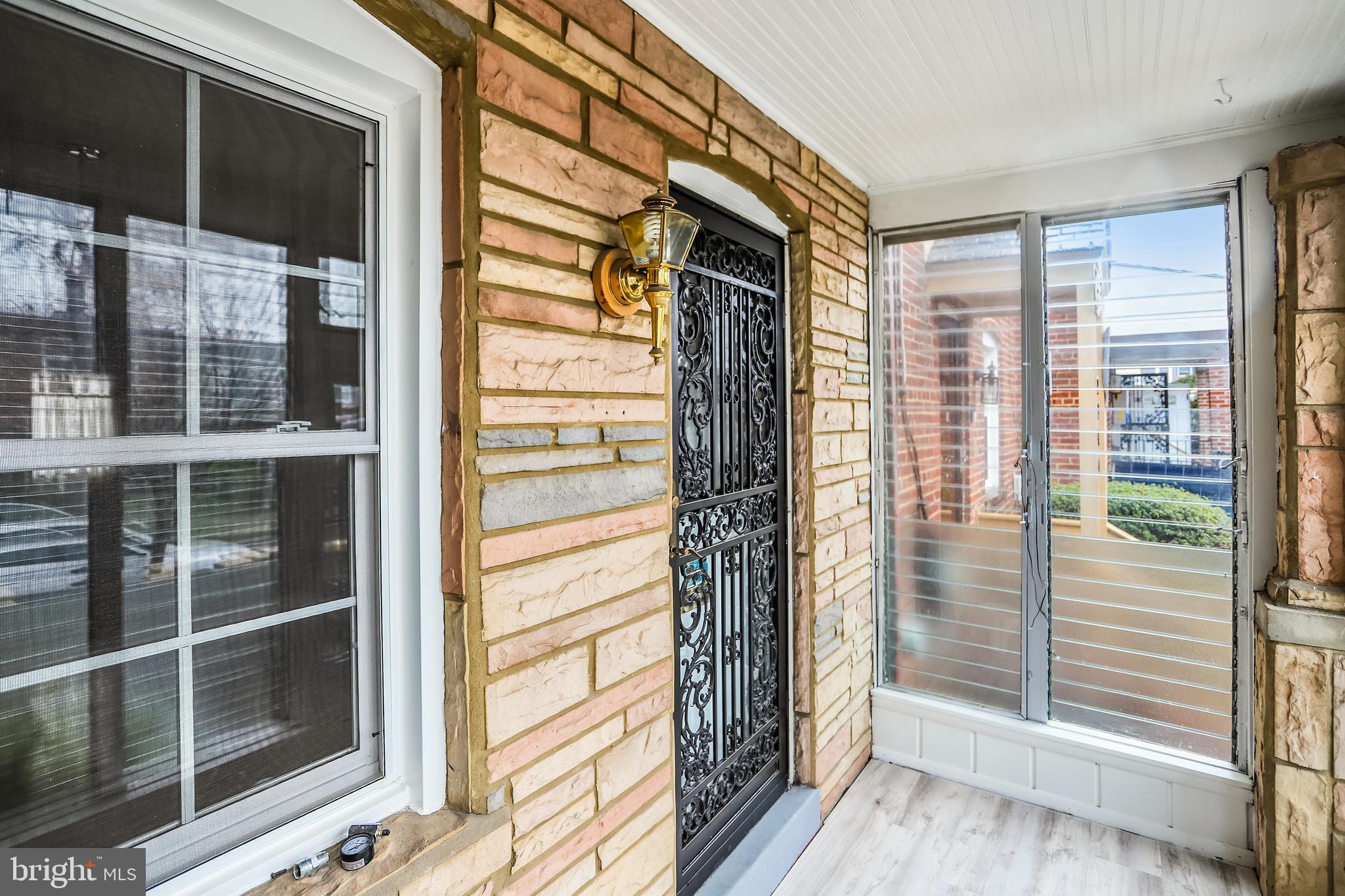 2344 Hunter Place Southeast Washington, DC 20020 - Photo 5 of 30 Enclosed front porch
