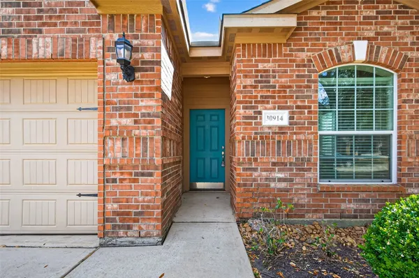 a front view of a house with a glass door